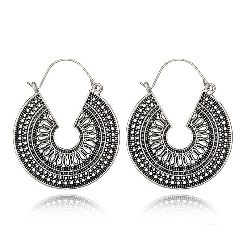 Ethnic carving earrings
